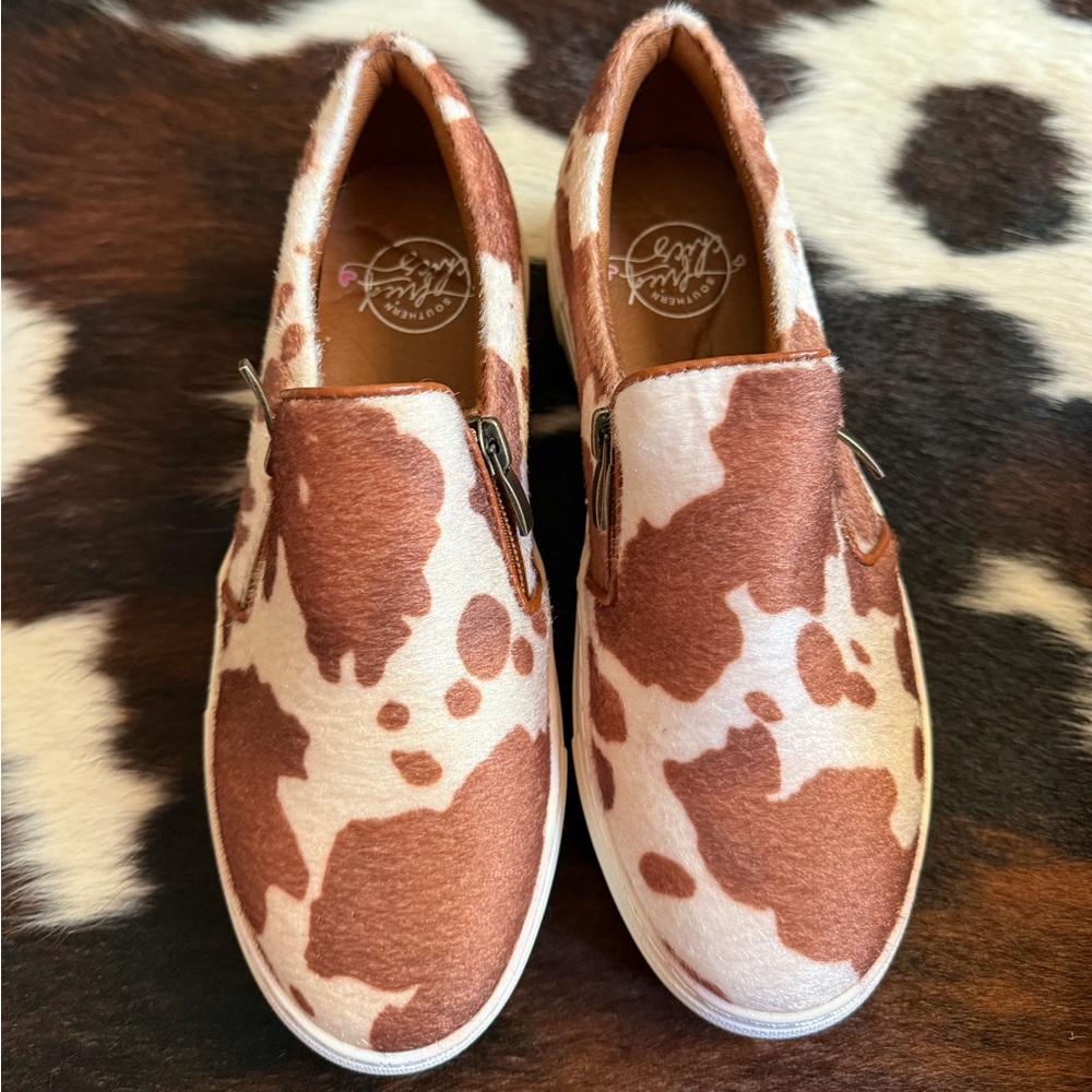 Slip-On Cow Print Sneakers in Brown and White